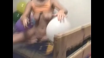 Preview 4 of Hoom Bilak - Chick strips and rubs balloons on her tits