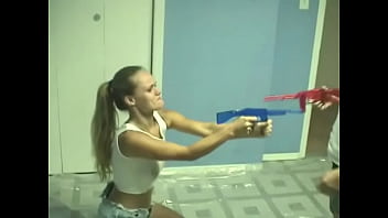 Preview 1 of Gai Sax Video - Lesbians sticks water gun nozzle in their cunts on floor