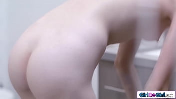 Preview 1 of Butey Slone - GirlDoGirl.com - Teen shower pussy licking a big tit milf