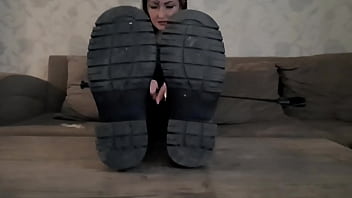 Preview 2 of Movie Swapping - Dominatrix Nika will make you lick the soles of her dirty boots. She pours a condom with cum on the soles of her shoes,  and you have to lick it all. Boot fetish.