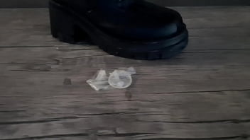 Preview 4 of Movie Swapping - Dominatrix Nika will make you lick the soles of her dirty boots. She pours a condom with cum on the soles of her shoes,  and you have to lick it all. Boot fetish.