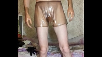 Preview 2 of Youlizz - man puts transparent latex shorts