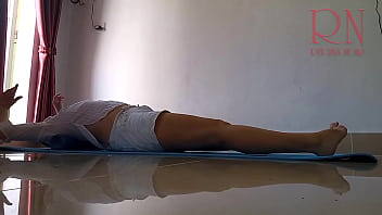 Preview 1 of Devine Bitchea - Regina Noir. A woman in white shorts practices yoga in the gym.