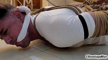 Preview 1 of Ora Wild - watch Peter barefoot sockgagged struggling helpless