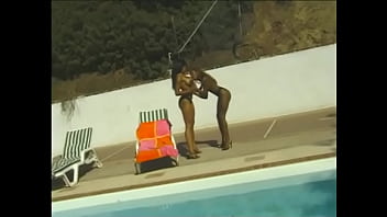 Preview 1 of Estudiantes Usulutecas - A red-haired bitch with a round ass and a brunette with big melons are passionately engaged in lesbian sex on a sun lounger and by the pool,  licking each other&#039_s pussies