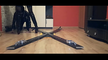 Preview 1 of Sasa Gray - Dominatrix Nika laid the slave down and chained him on the cross,  then sat her ass on his face and made the slave lick her pussy.