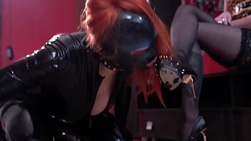 Preview 1 of Auncl Aunti With Sex - Dominatrix Nika in a latex dress plays with her latex doll. Shoe fetish and heel sucking