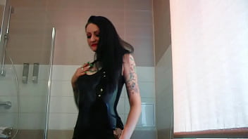 Preview 3 of Korean Lesbians Sex Video - Dominatrix Nika in a short black latex dress seduces you with her curves.