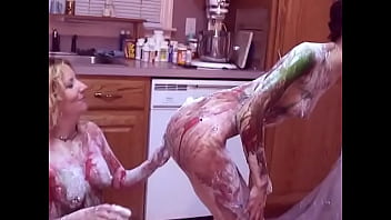 Preview 4 of Yesx X - Girls get hot for each other and paint each other&#039_s nice tits on kitchen floor