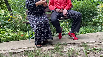 Preview 2 of Red Cyan Ass - Hot MILF jerks off a big dick into a glass in the park on a bench