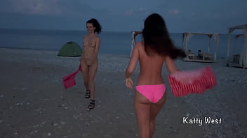Preview 1 of Ride That Face - Two naked sluts play with each other in the sea on a public beach