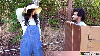 Preview 1 of Sunny Harit - Sexy MILF wife mowing the lawn and her neighbour guy thinks she looks sexy in her jeans overall