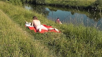 Preview 4 of Allura Jenson Kills Fuck - MILF sexy Frina on river bank undressed and sunbathes naked. Random man fisherman watching for her,  and in the end decided to join naked woman. Wild beach. Nudist beach. Public nudity. Public exposure. Naked in public