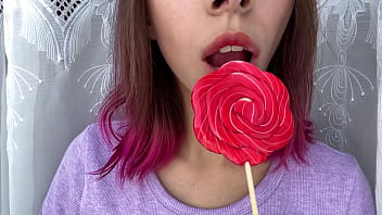 Preview 2 of Danita Xnxx - Naughty stepsister sucks a lollipop and show her long hot sexy tongue