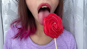 Preview 1 of Danita Xnxx - Naughty stepsister sucks a lollipop and show her long hot sexy tongue