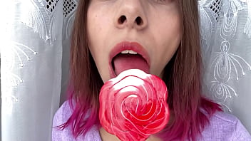 Preview 4 of Danita Xnxx - Naughty stepsister sucks a lollipop and show her long hot sexy tongue