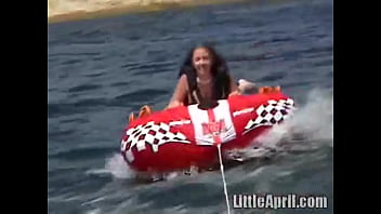 Preview 4 of Teensex 57 - Sexy teen Little April playing with her snatch outdoors in rubber boat
