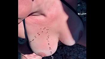 Preview 1 of Xnviedo Hd - Pissing on MILF Wife&rsquo_s Pierced Fake Tits Outside Golden Shower