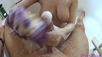 Preview 2 of Yuouporn - Busty girl washes her boyfriend&#039_s cock with tits