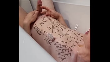 Preview 2 of Black White Catfight - Teenage slave with bodywriting peeing all-over himself