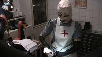 Preview 1 of Sail Pack - Rubbernurse Agnes - long grey latex nurse dress,  white surgery hood and mask - Part 2 - pegging with a long fleshy dildo,  premature cumshot of the whole spermcream