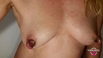 Preview 1 of Mia Secrlett - nippleringlover hot inserting 16mm metal beads in extreme stretched nipple piercings