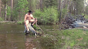 Preview 2 of Kina Ass - Naked on a stump in the river.