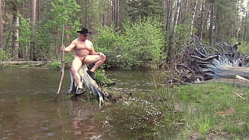 Preview 1 of Kina Ass - Naked on a stump in the river.