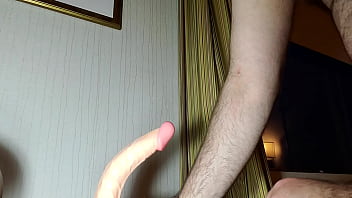 Preview 1 of Mom And Son Breeding Sex - Nude Martin Lavall&eacute_e pratices to engulf a eight inch dildo on a table