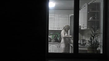 Preview 2 of Step Sister Xxx Cauth - Peeping. Voyeur. Neighbor pervert voyeur in evening on street looks out window as naked sexy neighbor in kitchen prepares dinner for her husband. Naked in public. Naked at home. Family.  Outdoor