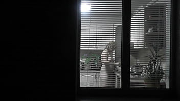 Preview 3 of Step Sister Xxx Cauth - Peeping. Voyeur. Neighbor pervert voyeur in evening on street looks out window as naked sexy neighbor in kitchen prepares dinner for her husband. Naked in public. Naked at home. Family.  Outdoor