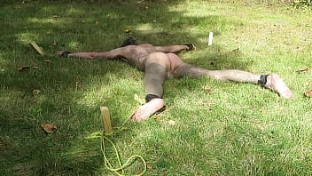 Preview 1 of Xdesi Mobi Dog - Nuisette007 tied spread naked outdoors and facing down
