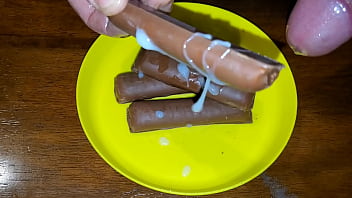 Preview 4 of Africa School Sex Videos - Twix covered in my Cum look so good. Which one should I eat first the right or the left.