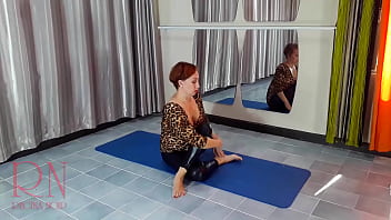 Preview 2 of Ava Koxxx Double - Regina Noir. A woman in a leopard bodysuit and latex leggings is doing yoga in the gym. Yoga in sexy leotards. 1