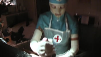 Preview 1 of Been Ke Mom - Rubbernurse Agnes - first try-on of her new blue latex nurse dress - the test victim gets his colon cunt elbow-deep stuffed and successfully his cock milked off...