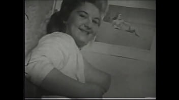 Preview 1 of School X Xnxhd - Busty lady with a charming smile caresses her tits on camera in 60s filme