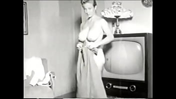 Preview 1 of Masterbating Togeather - Vintage busty beauty bends over bends over TV showing her big tight breasts for you