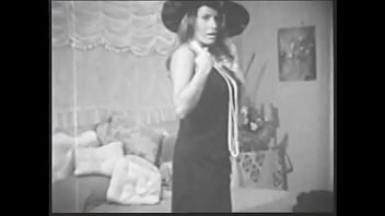 Preview 1 of Xxpanuvido - Dark-haired babe erotically strips off her clothes and caresses her hairy pussy on camera for a 50s porn magazine