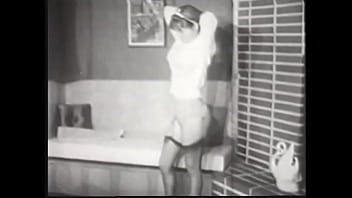 Preview 1 of Horny Sister Virgin - Watch an erotic movie of the 50s where a pretty girl caresses herself near the fireplace in the living room