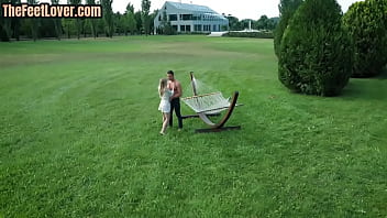 Preview 1 of Capin Mom - Foot model jerks dick with feet outdoors in erotic couple