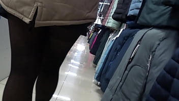 Preview 4 of Flash Touch Girl - A hidden camera in a fitting room spies on a girl with a gorgeous ass and beautiful legs in pantyhose. Then a voyeur peeks under her skirt in a public store. Amateur foot fetish.