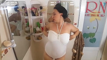 Preview 2 of Sabrina Cartier - Nice lady in the shower room rubs cosmetic massage lotion oil on her beautiful legs. cam 1-2