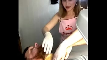 Preview 3 of Doll Cax - Classy blonde waxes a man&#039_s face,  her gorgeous breasts popping out