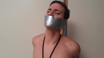 Preview 1 of Naida 1 - Felipe tapegagged by BondageMan