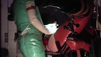 Preview 3 of Tesarsex Com - Rubbernurse Agnes - jade green clinic nurse dress with mask,  white gloves,  clear PVC apron,  PART 2,  handjob,  pegging to the limit with a long midsize diameter dildo