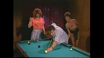 Preview 1 of Rhiehele Ryan - Nasty brunette Sharon Mitchell and playful redhaired floozie Viper became worn out muscular dude to the billiard saloon and made him fuck both of them right on the pool table