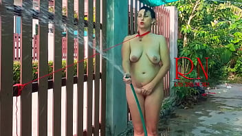 Preview 3 of Megan Rain Twococks - Slave Humiliation Slave woman and Master. Shower at the yard.