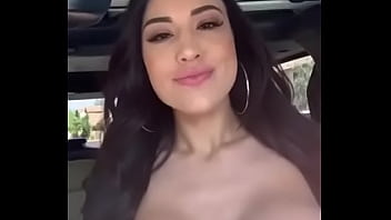 Preview 2 of Nina Malk - Black haired girl pulls out huge tits in car
