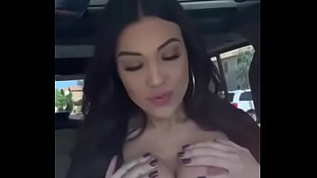 Preview 3 of Nina Malk - Black haired girl pulls out huge tits in car