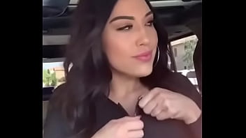 Preview 1 of Nina Malk - Black haired girl pulls out huge tits in car